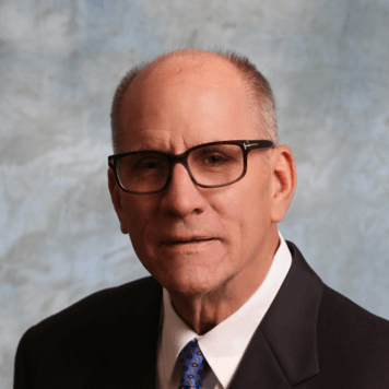 Portrait photo of doctor Michael Macaluso, a dentist in West Houston